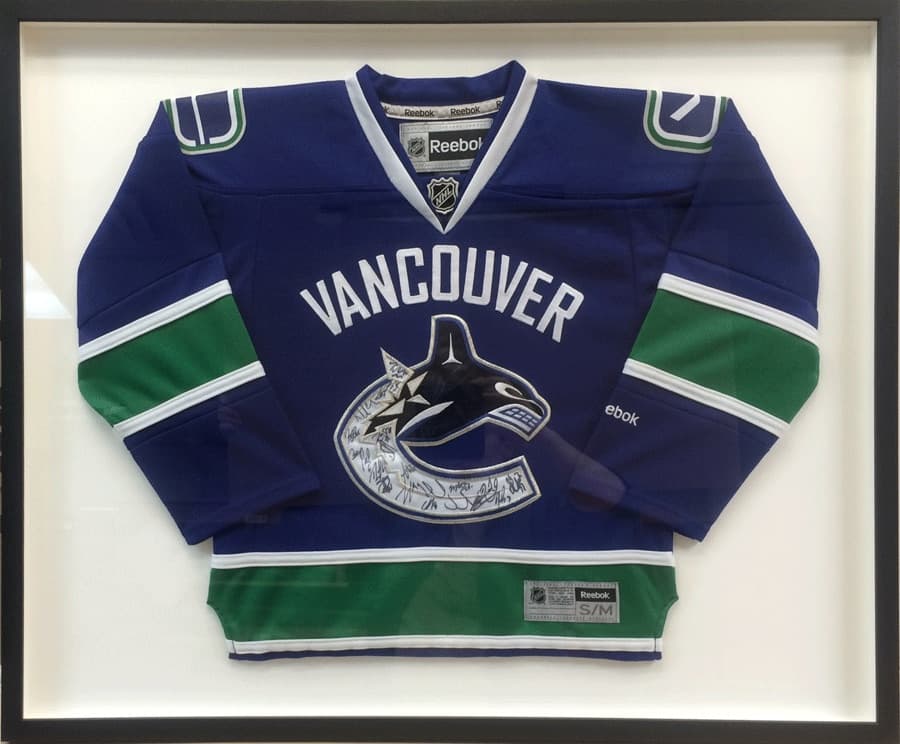 Sports jersey in a custom display frame